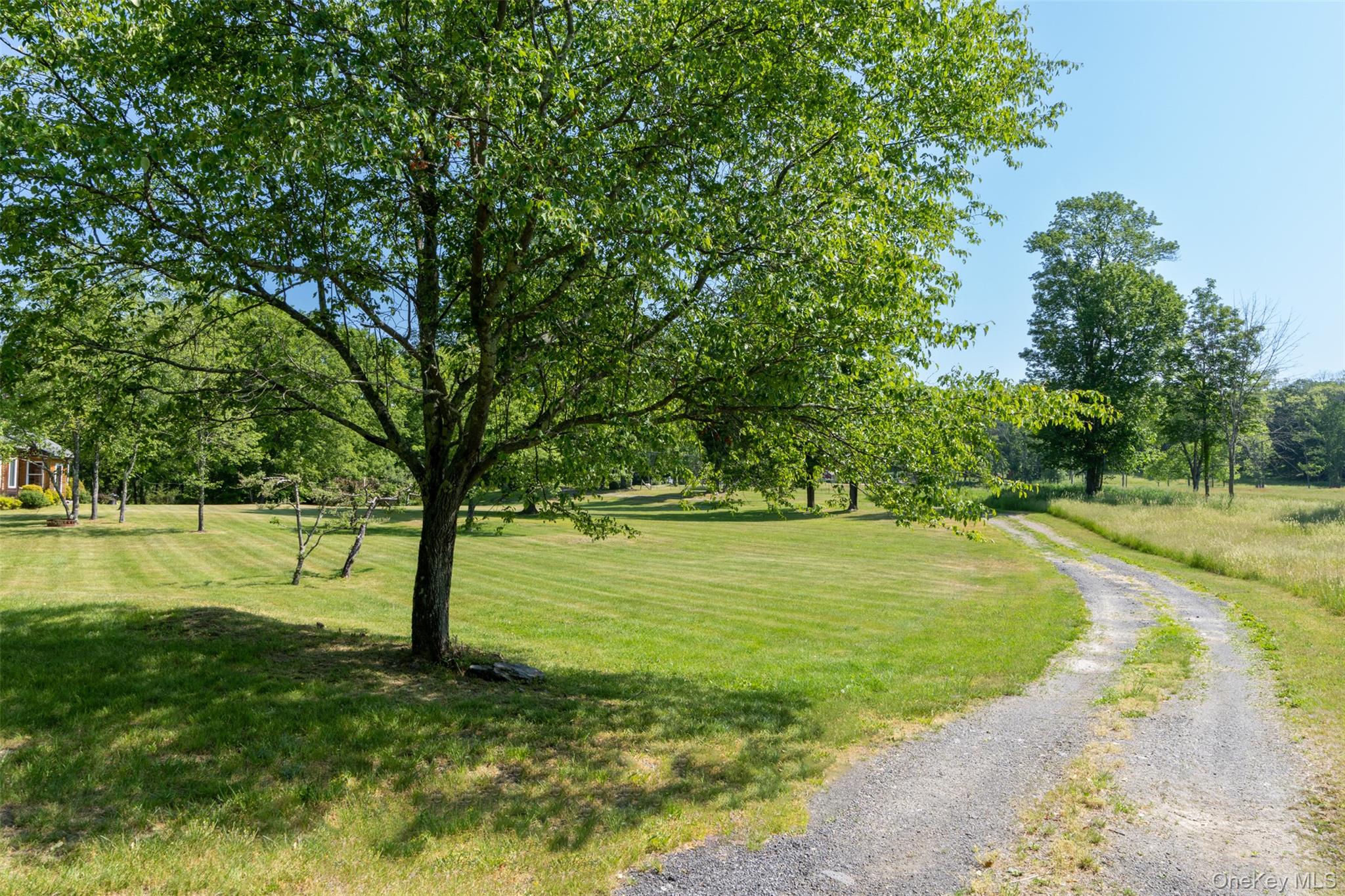 508 Woodstock Road Millbrook, NY 12545 - Photo 5 of 46 a view of an outdoor space with a lake view