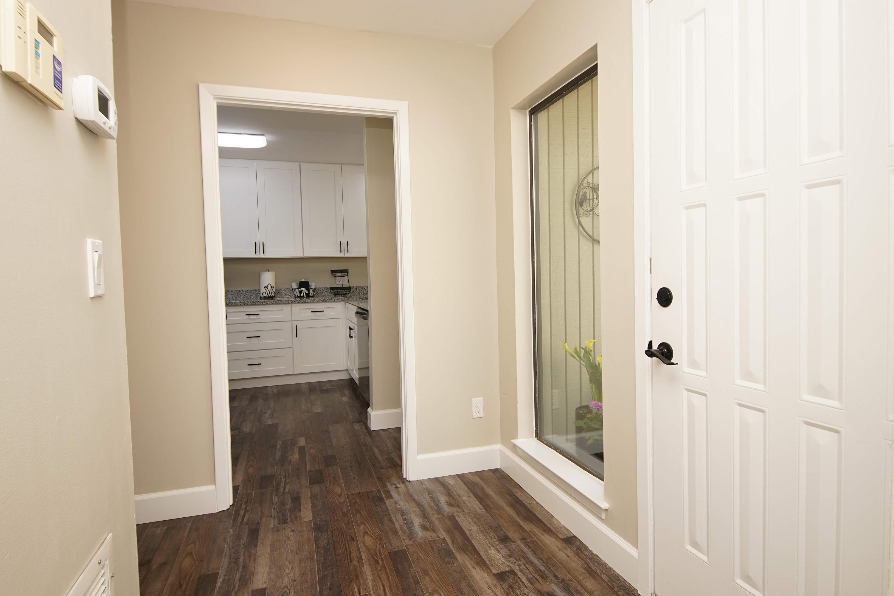 800 Bay Drive, Unit 8 Niceville, FL 32578 - Photo 22 of 29 a view of kitchen with wooden floor