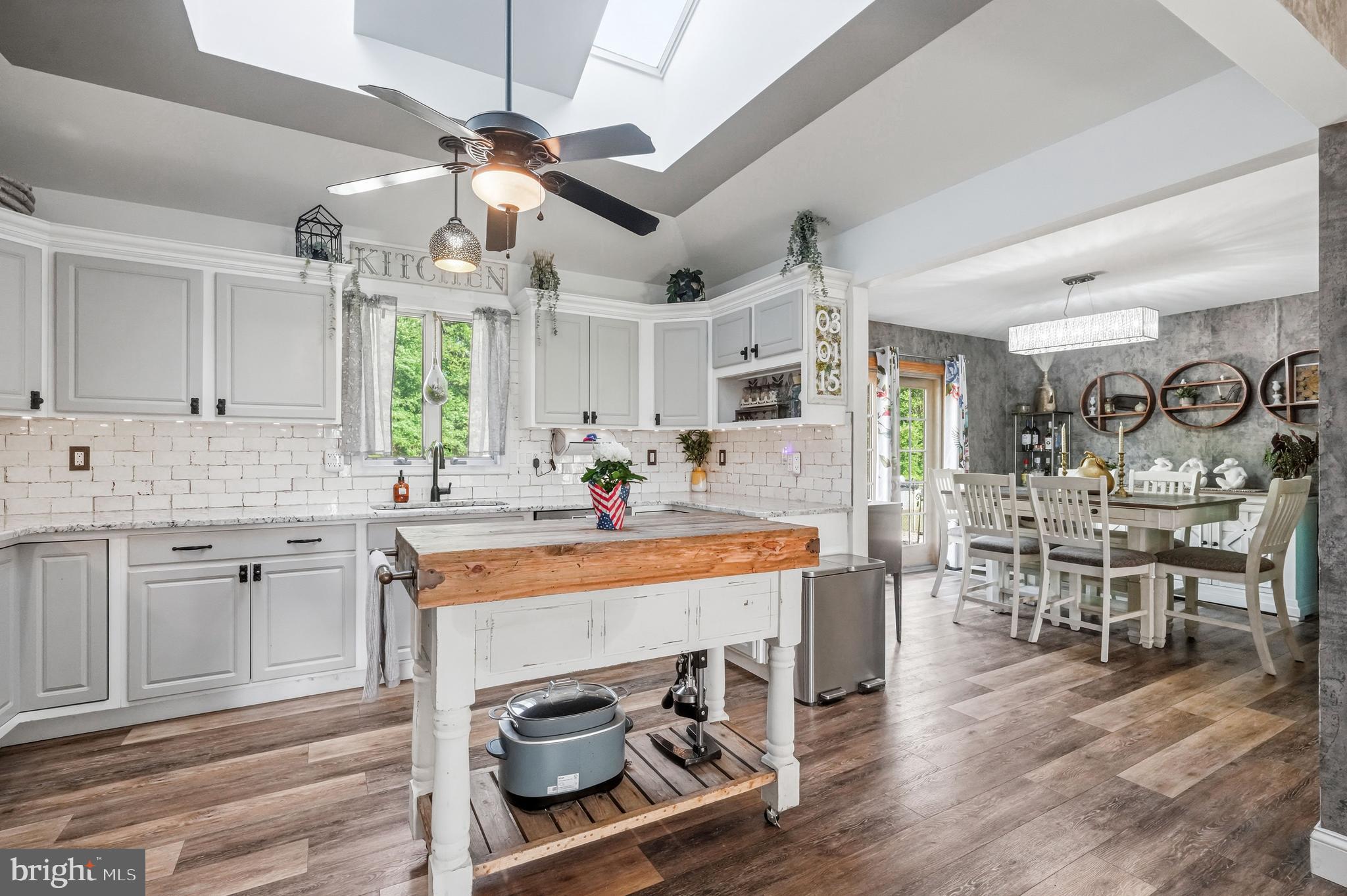 705 Garden Road Pittsgrove, NJ 08318 - Photo 22 of 72 a view of a kitchen and dining room