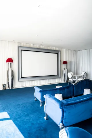 a living room with couch and a window