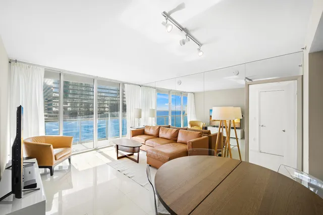 a bathroom with a shower and a toilet