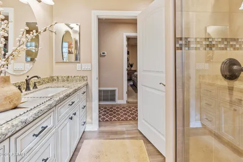 a spacious bathroom with a shower