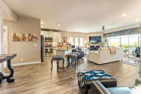 a living room with furniture and a table