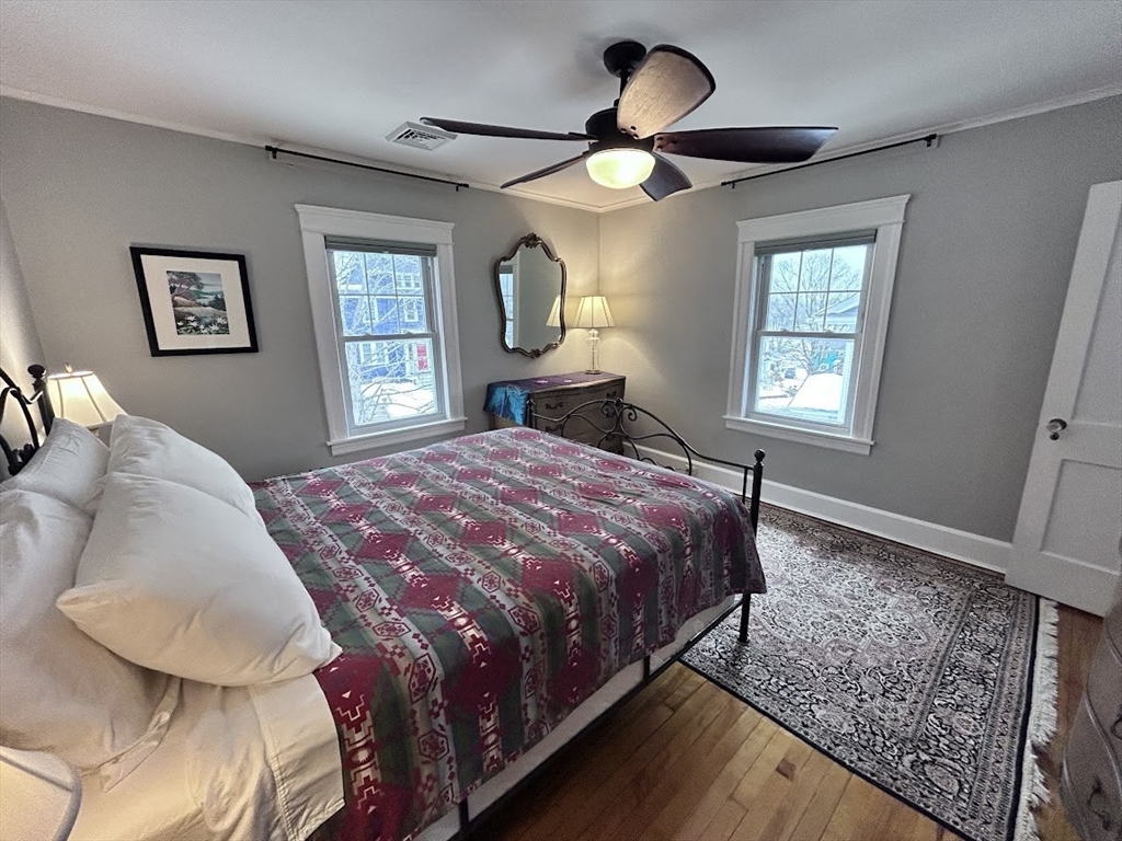 17 Longfellow Road Worcester, MA 01602 - Photo 15 of 19 a bed sitting in a bedroom next to a window