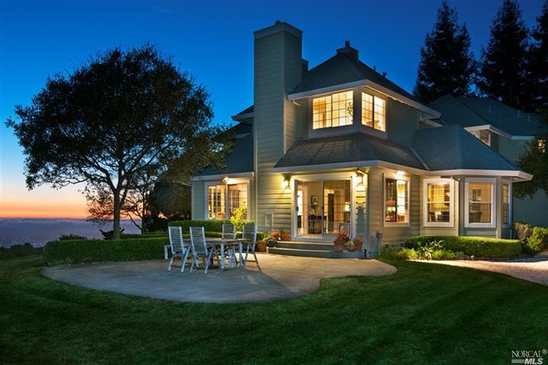 5256 Lichau Road Penngrove, CA 94951 - Photo 1 of 1 a front view of a house with swimming pool and garden