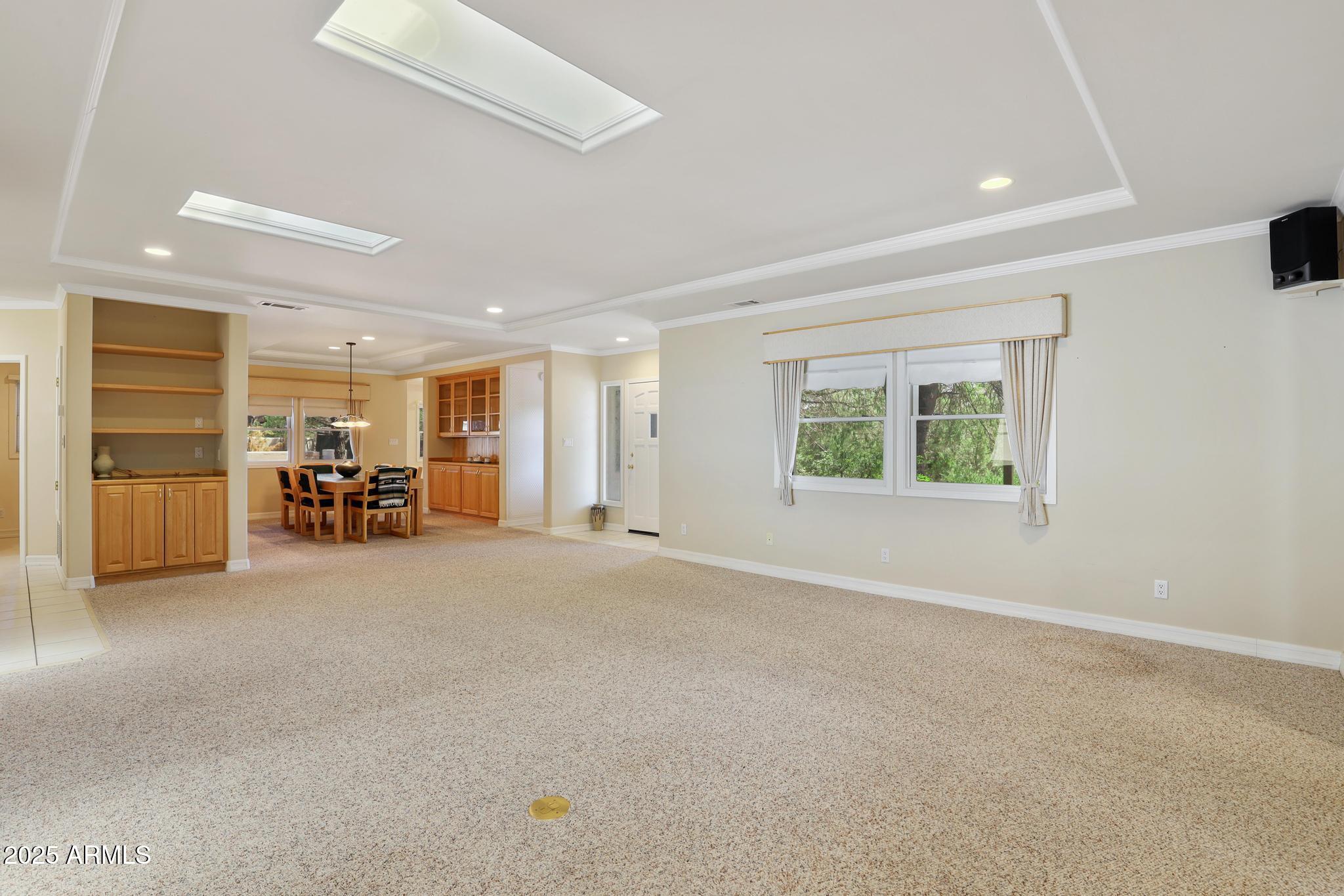 503 West Locust Road Payson, AZ 85541 - Photo 11 of 40 an empty room with furniture and a window