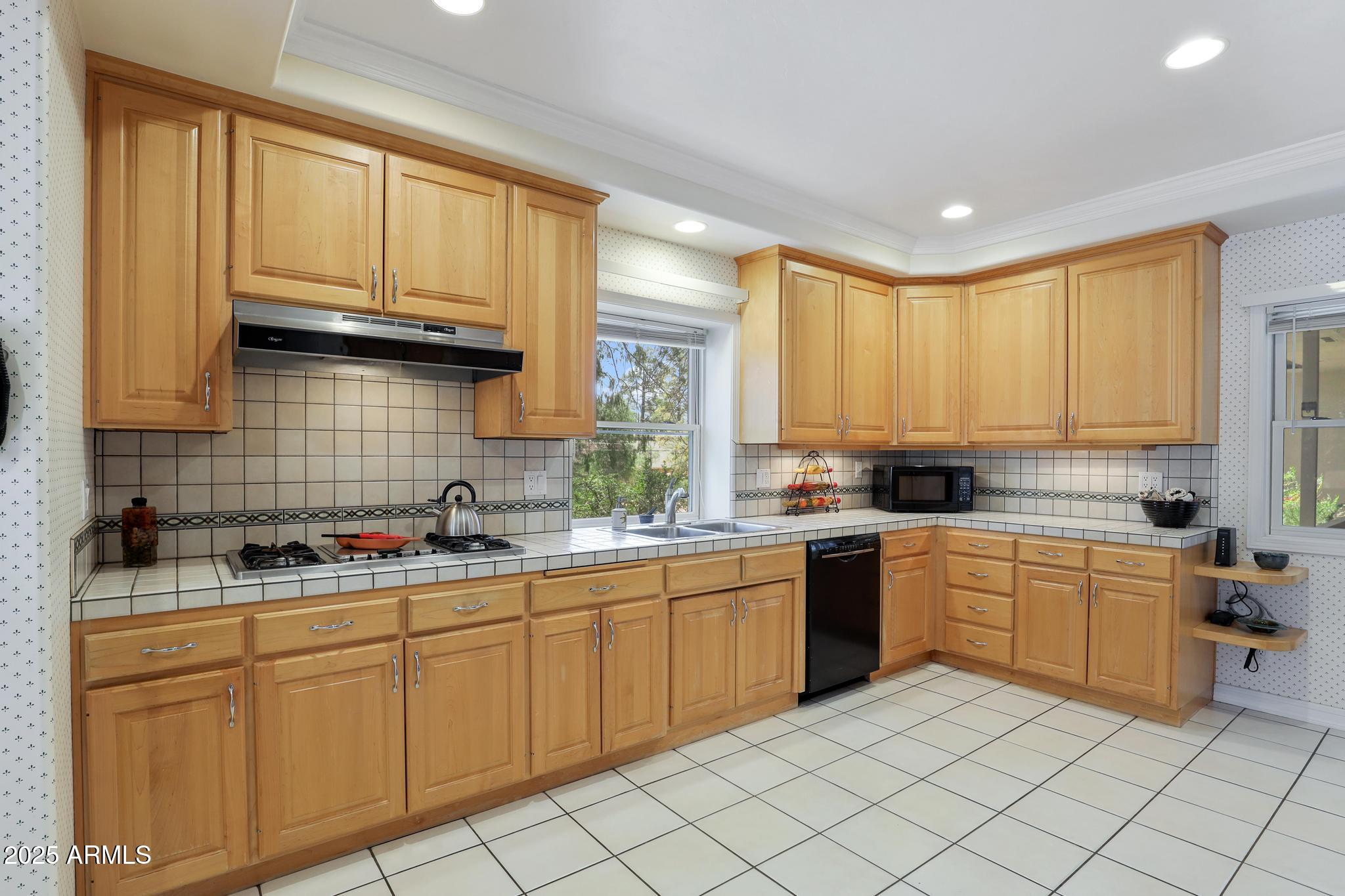 503 West Locust Road Payson, AZ 85541 - Photo 15 of 40 a kitchen with a sink and cabinets