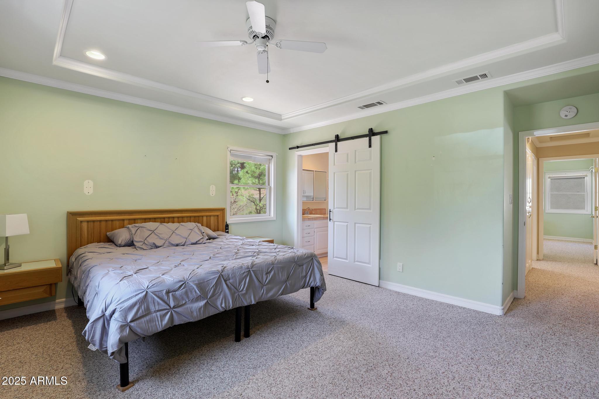 503 West Locust Road Payson, AZ 85541 - Photo 18 of 40 a bedroom with a bed closet and a mirror