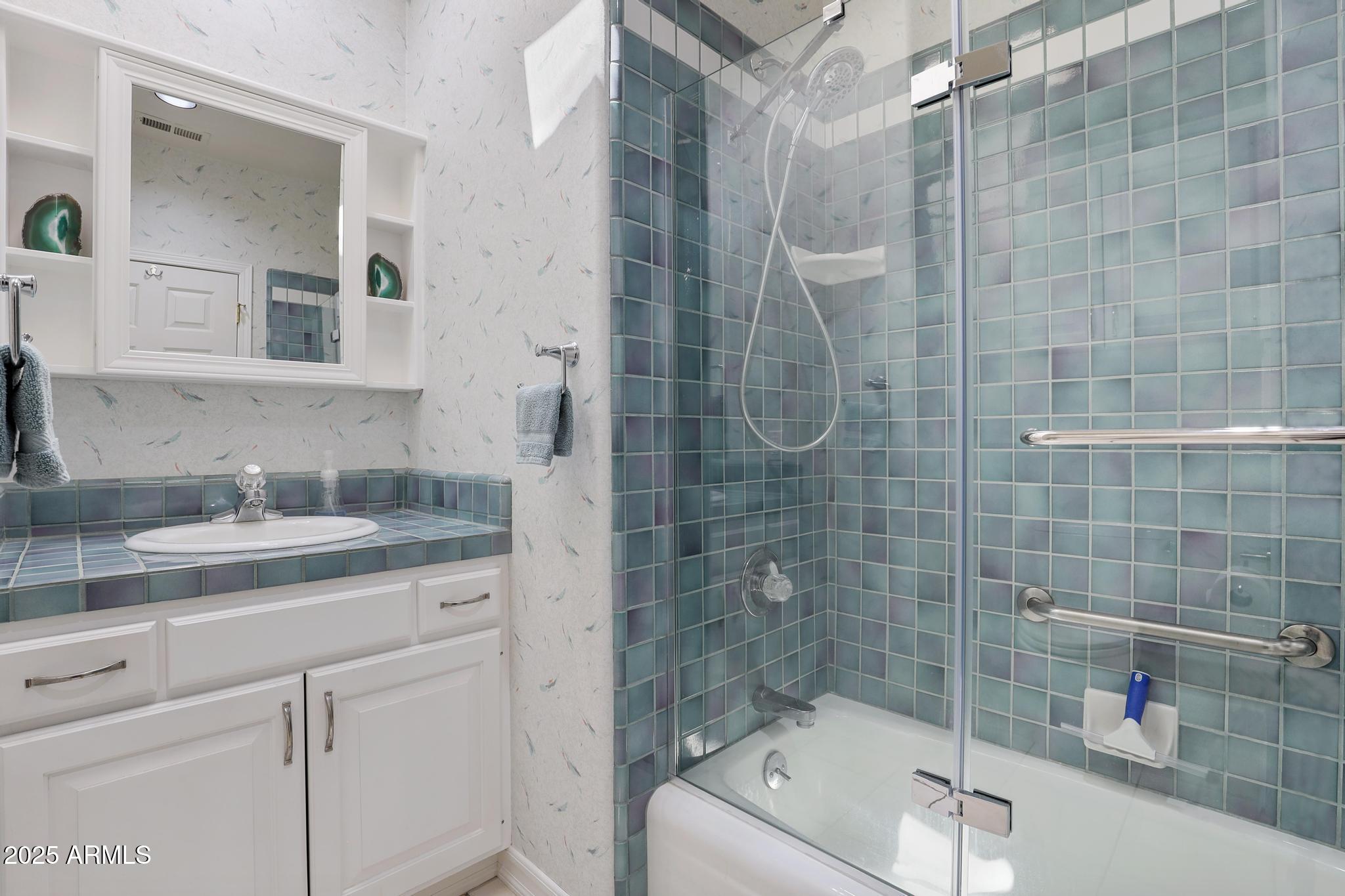 503 West Locust Road Payson, AZ 85541 - Photo 22 of 40 a bathroom with a granite countertop sink a toilet and shower