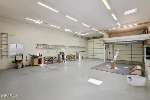 a room with lots of table and chairs