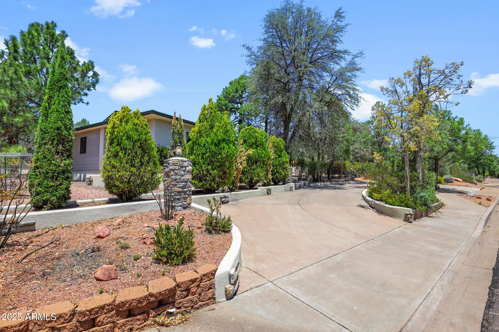 503 West Locust Road Payson, AZ 85541 - Photo 3 of 40 a view of a garden with pathway