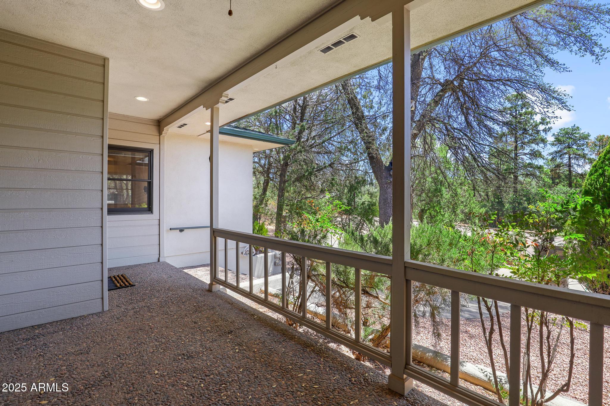 503 West Locust Road Payson, AZ 85541 - Photo 6 of 40 a view of a porch with wooden floor and stairs