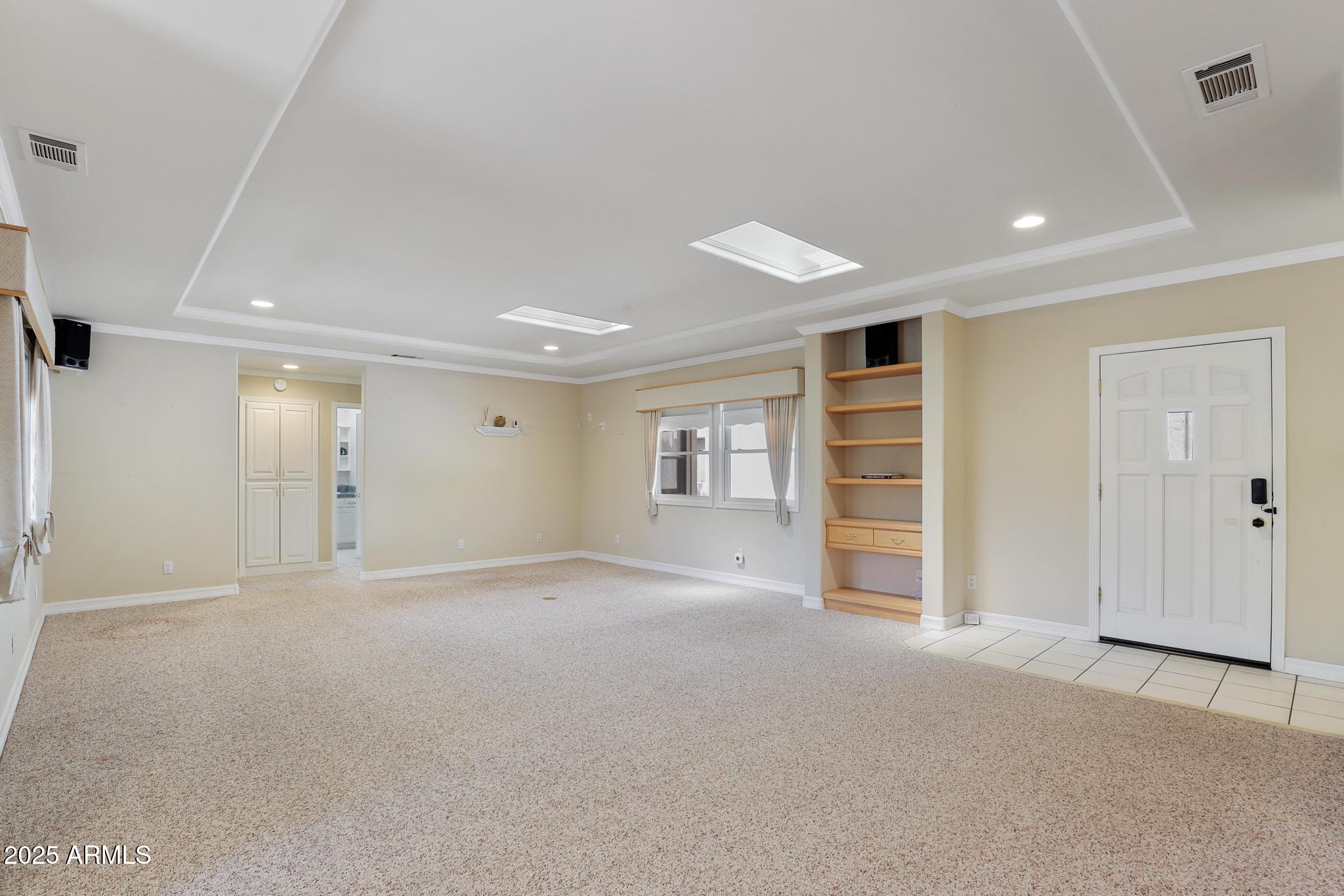 503 West Locust Road Payson, AZ 85541 - Photo 9 of 40 a view of a big room with closet and windows