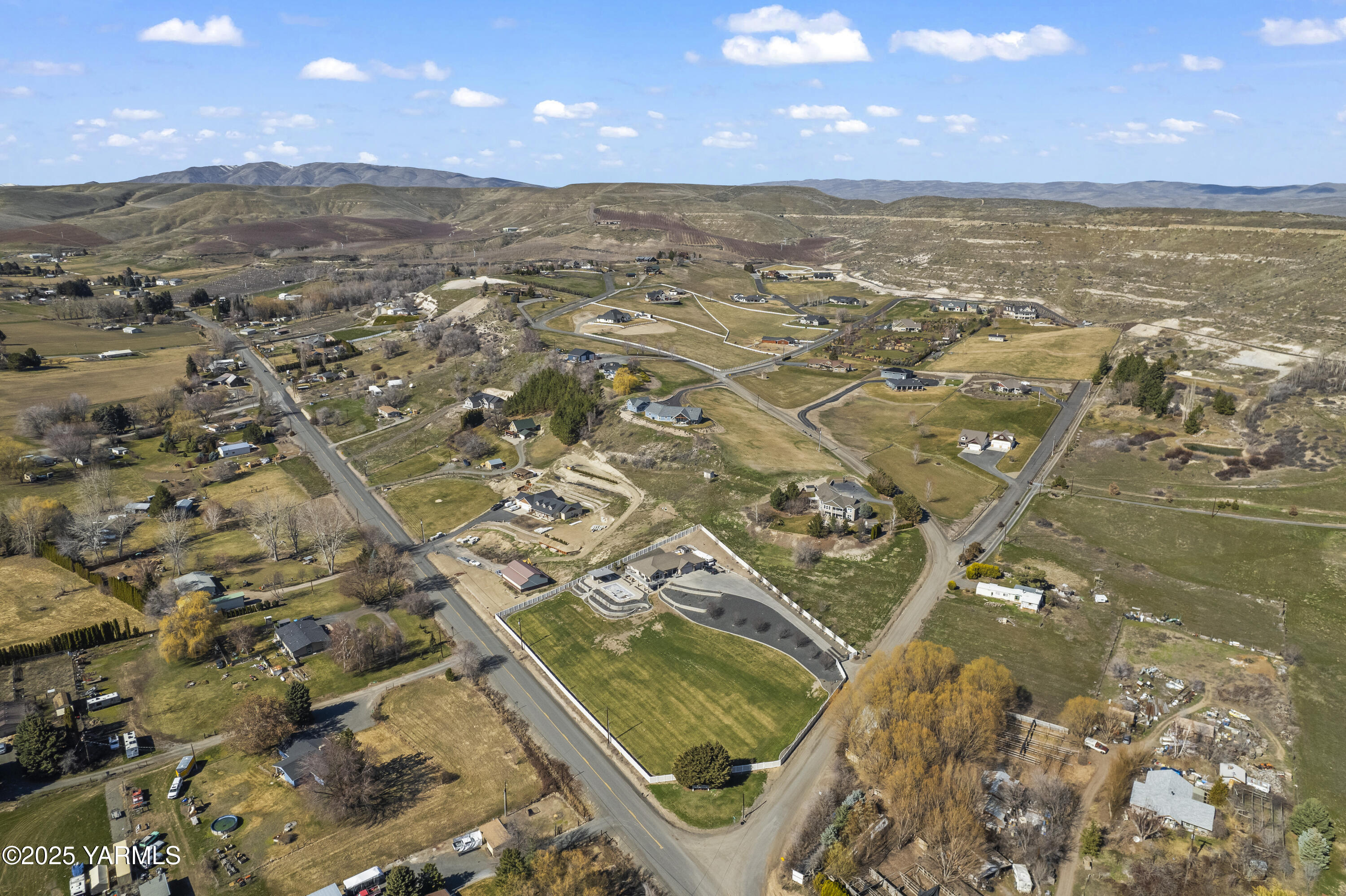Nka Selah Ridge Drive, Unit LOT 2 Selah, WA 98942 - Photo 6 of 8 an aerial view of residential houses with outdoor space
