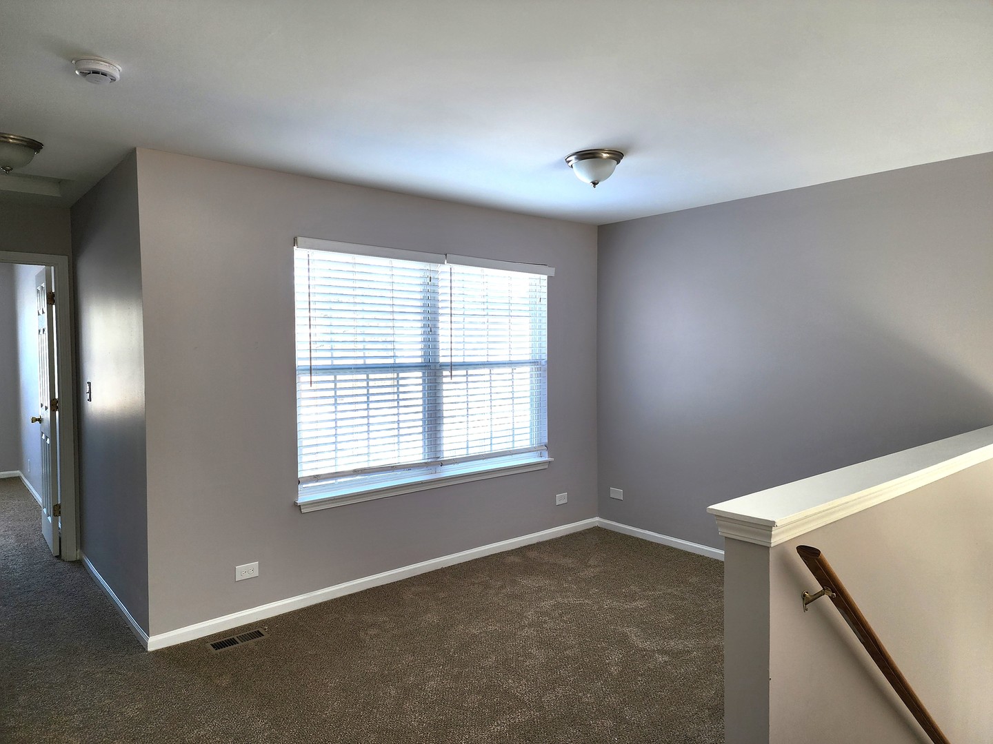 13 Brian Court Algonquin, IL 60102 - Photo 8 of 13 a view of an empty room with a window