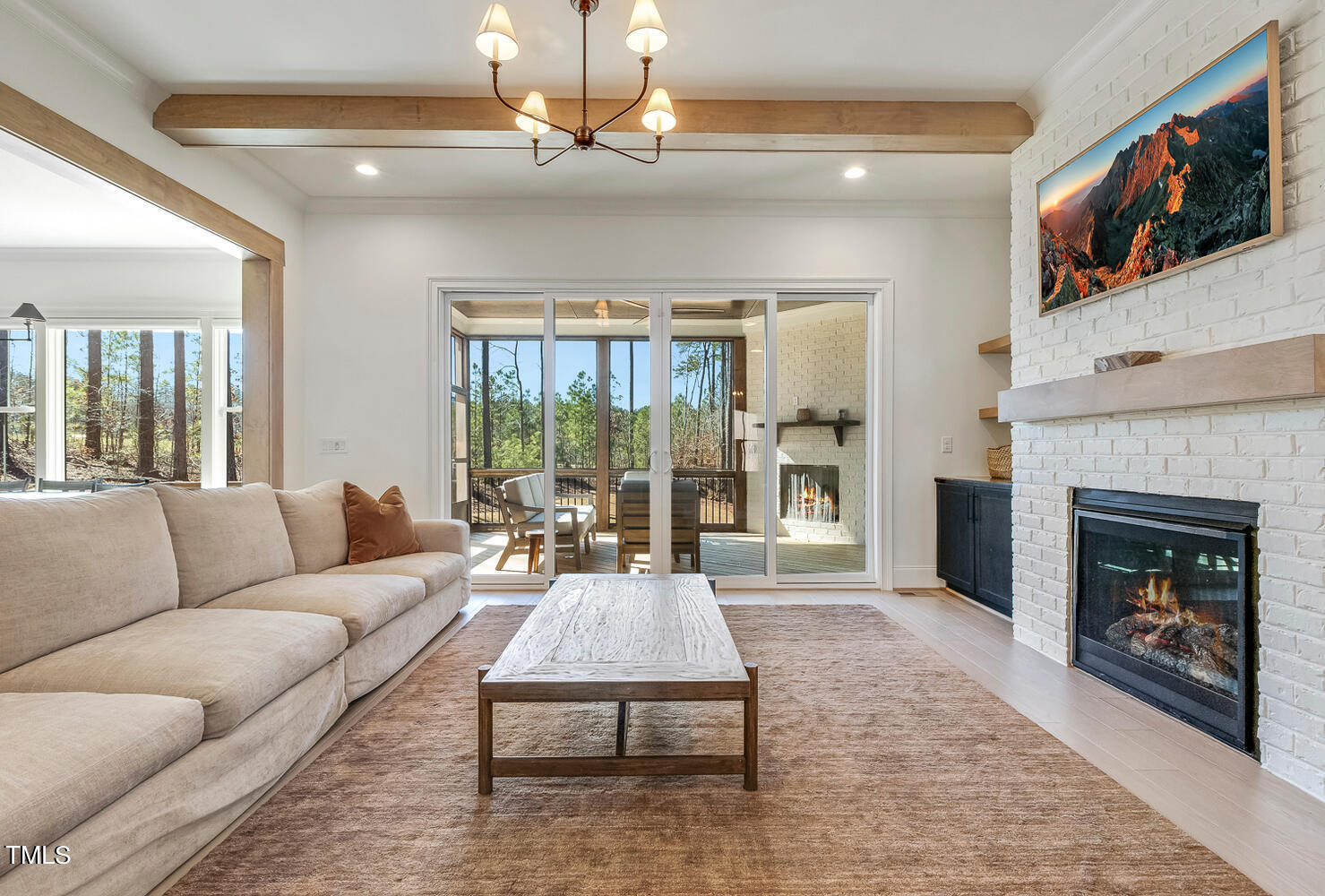 900 Harrison Ridge Road Wake Forest, NC 27587 - Photo 14 of 78 a living room with furniture and a fireplace