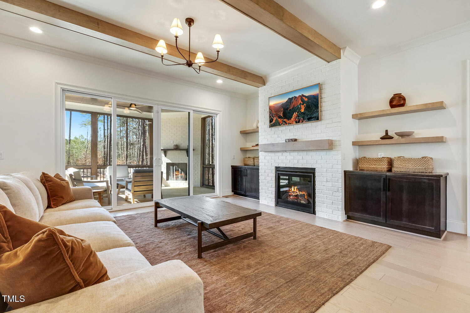 900 Harrison Ridge Road Wake Forest, NC 27587 - Photo 15 of 78 a living room with furniture and a fireplace