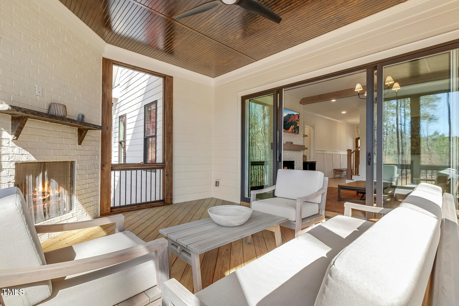 900 Harrison Ridge Road Wake Forest, NC 27587 - Photo 21 of 78 a living room with furniture and a fireplace
