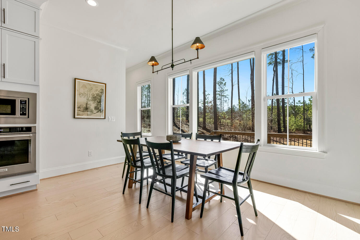 900 Harrison Ridge Road Wake Forest, NC 27587 - Photo 33 of 78 a view of a dining room with furniture window and outside view