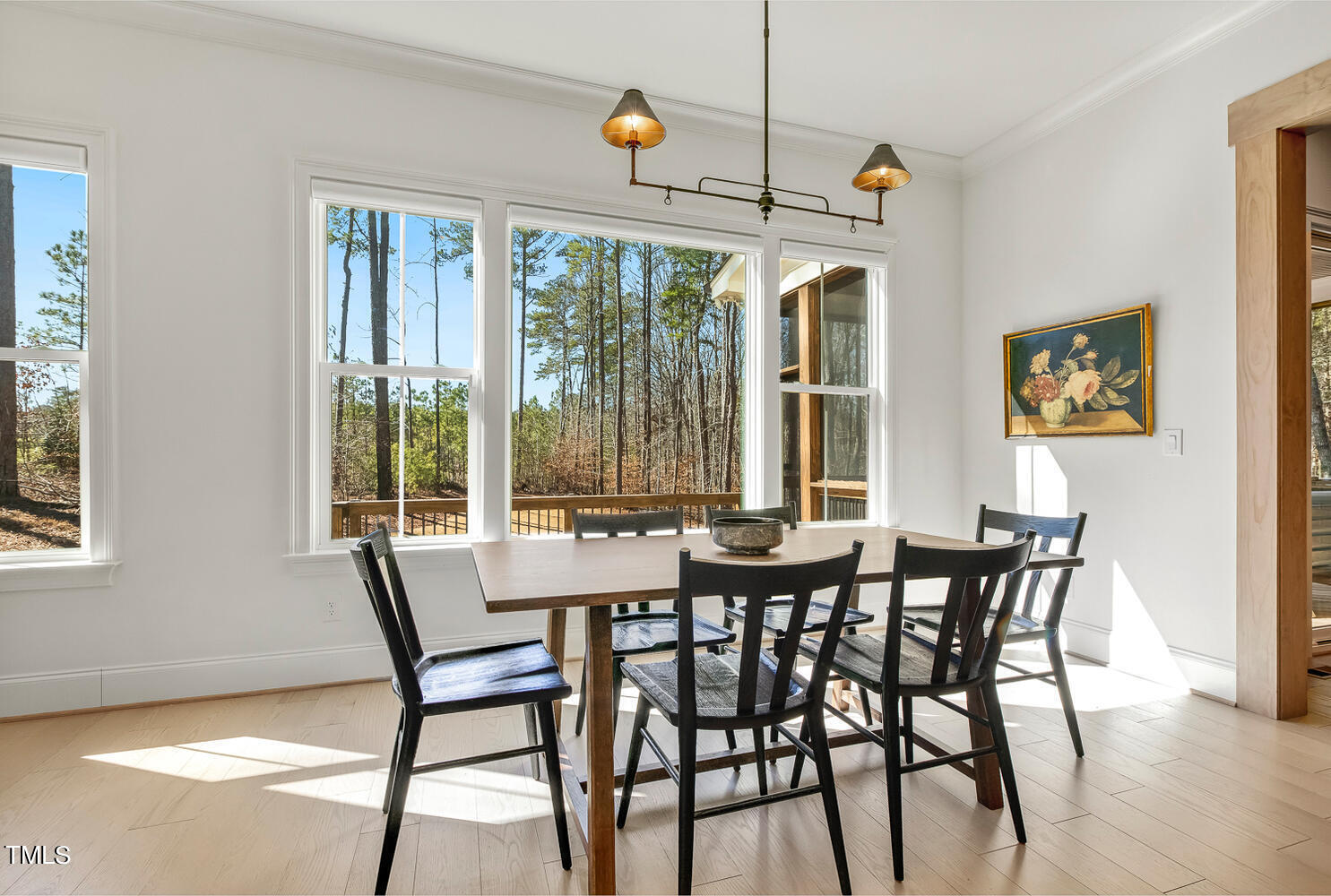 900 Harrison Ridge Road Wake Forest, NC 27587 - Photo 34 of 78 a view of a dining room with furniture wooden floor and chandelier