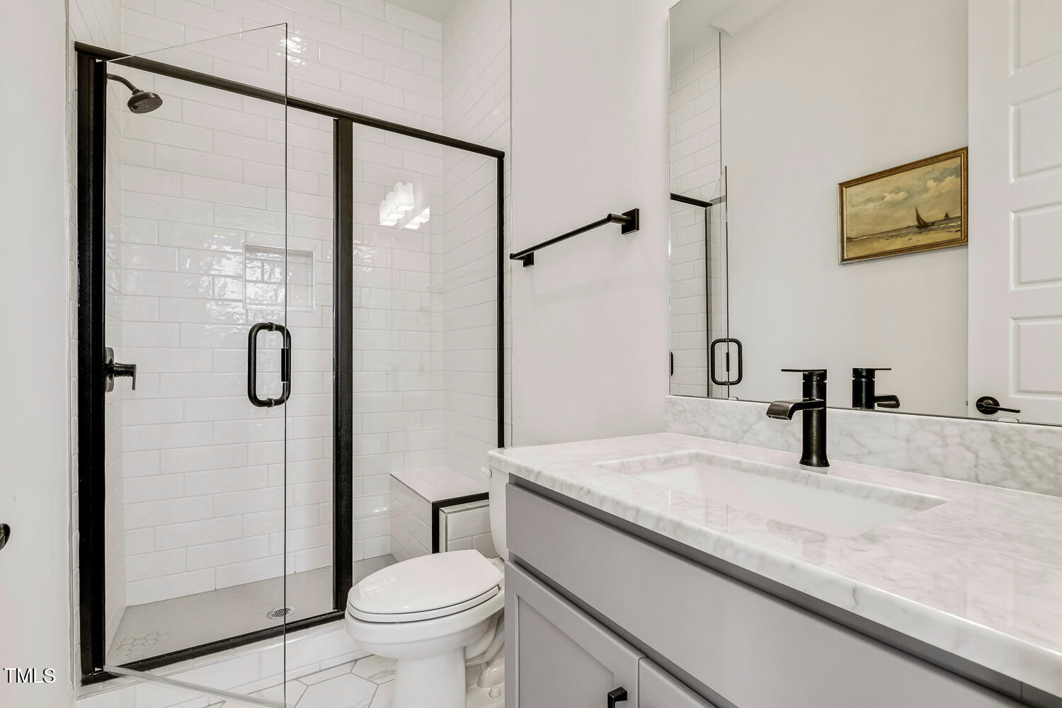 900 Harrison Ridge Road Wake Forest, NC 27587 - Photo 38 of 78 a bathroom with a granite countertop sink a toilet and shower