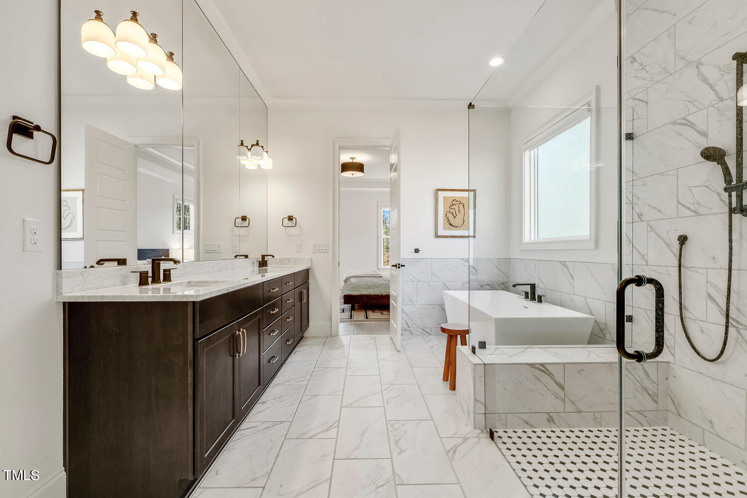 900 Harrison Ridge Road Wake Forest, NC 27587 - Photo 46 of 78 a spacious bathroom with a double vanity sink a mirror and a bathtub