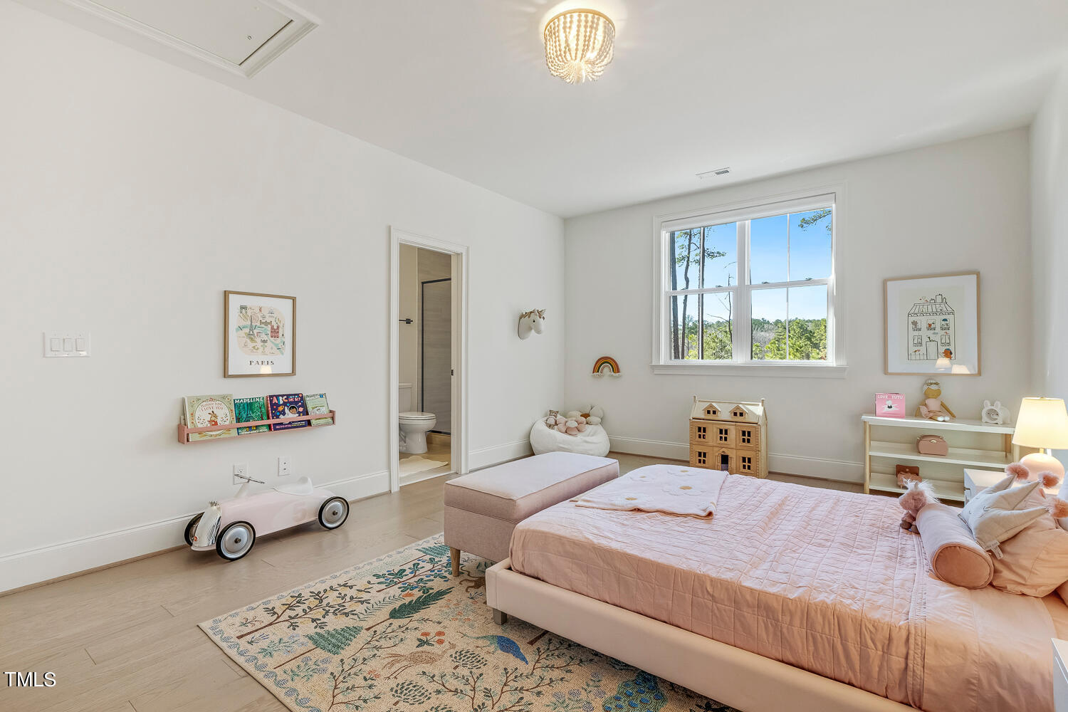 900 Harrison Ridge Road Wake Forest, NC 27587 - Photo 50 of 78 a bedroom with a bed and a table