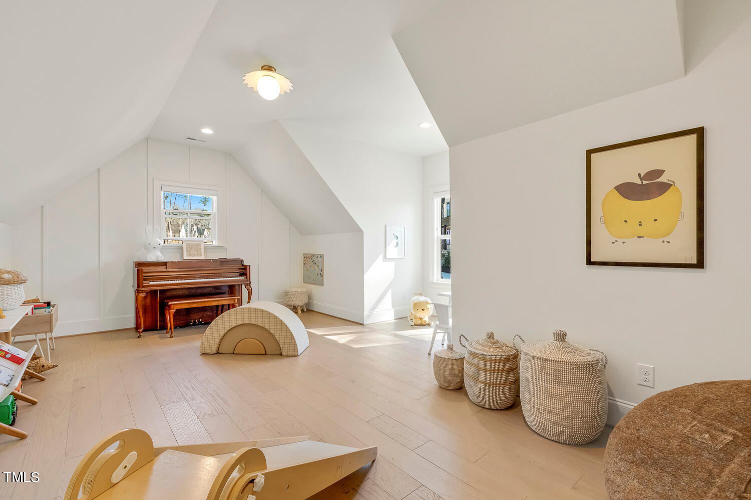 900 Harrison Ridge Road Wake Forest, NC 27587 - Photo 62 of 78 a bedroom with furniture and a chandelier