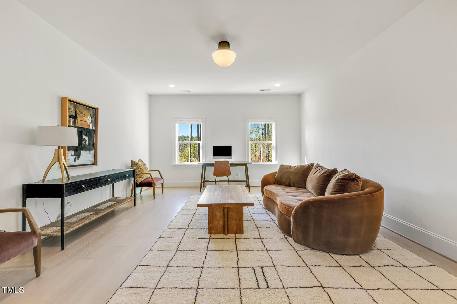 900 Harrison Ridge Road Wake Forest, NC 27587 - Photo 66 of 78 a living room with furniture and a rug