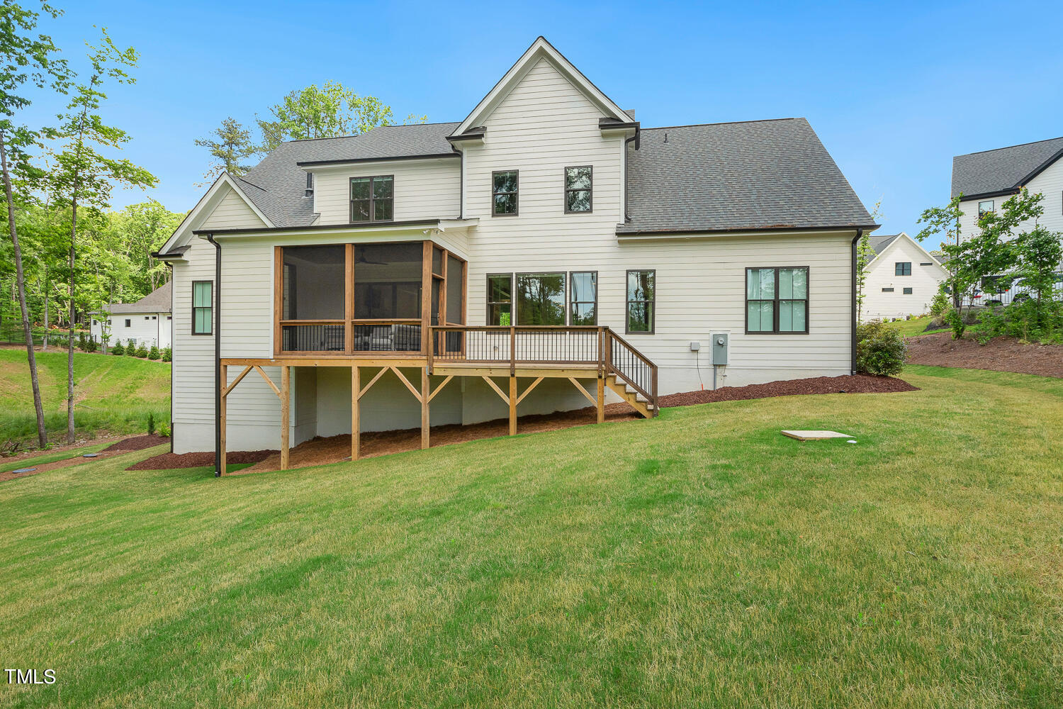 900 Harrison Ridge Road Wake Forest, NC 27587 - Photo 68 of 78 a view of a house with a yard and sitting area