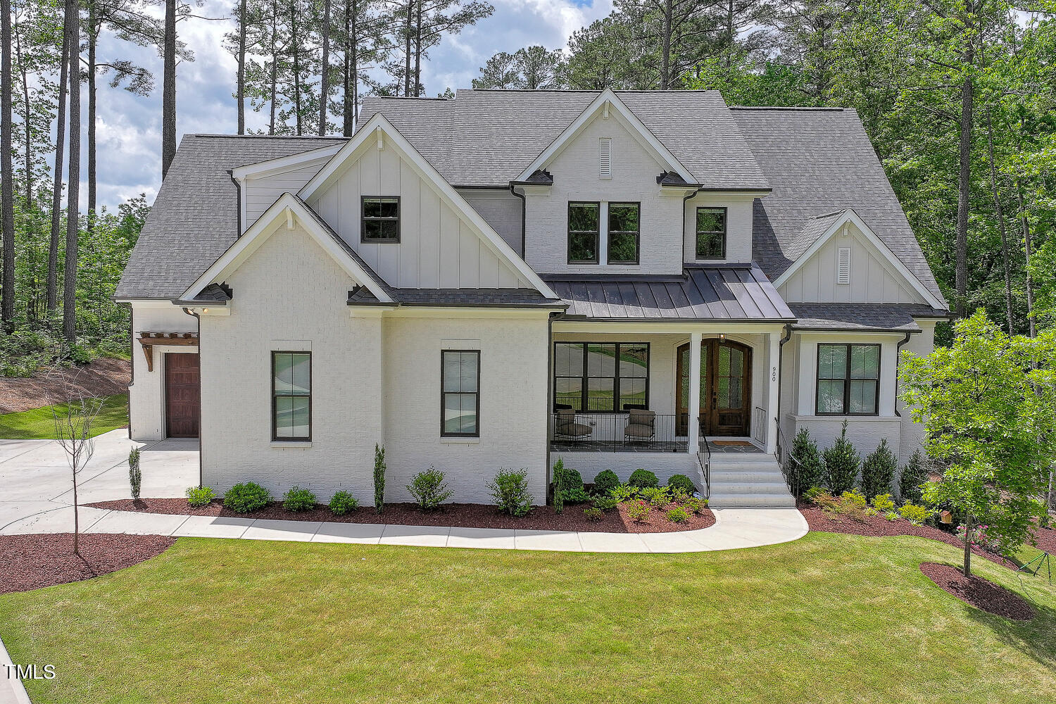 900 Harrison Ridge Road Wake Forest, NC 27587 - Photo 73 of 78 a front view of a house with a yard
