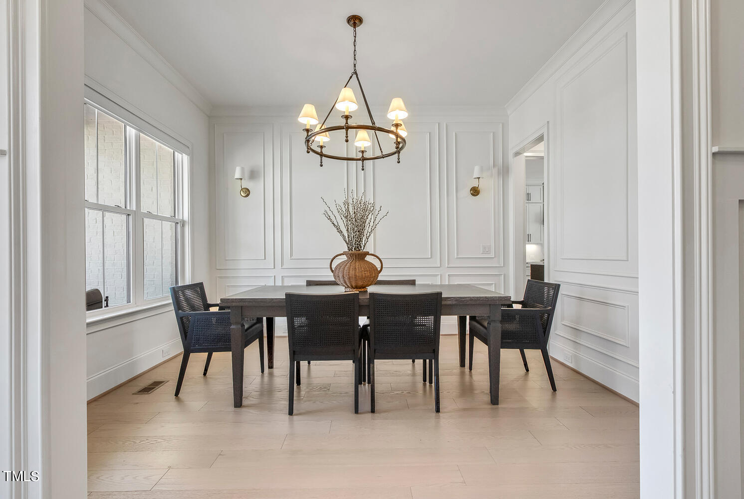 900 Harrison Ridge Road Wake Forest, NC 27587 - Photo 8 of 78 a dining room with furniture a chandelier and a rug