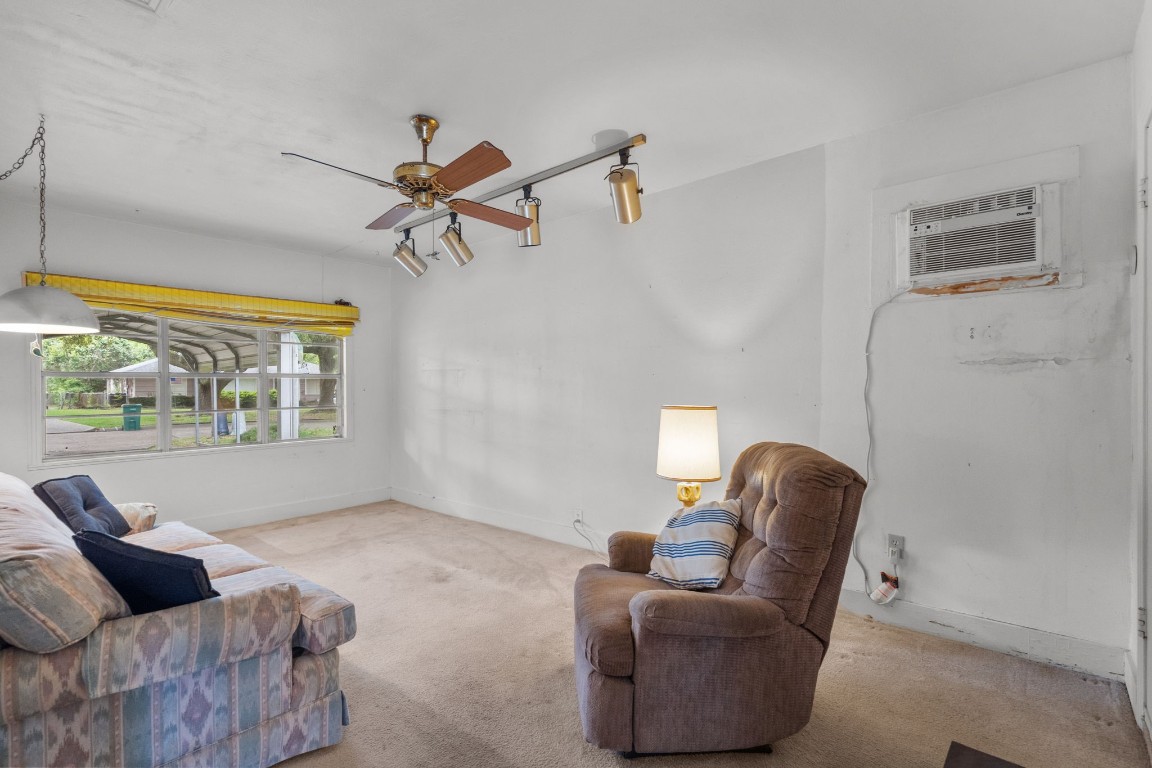 1126 Orange Street La Marque, TX 77568 - Photo 15 of 36 a living room with furniture and a window