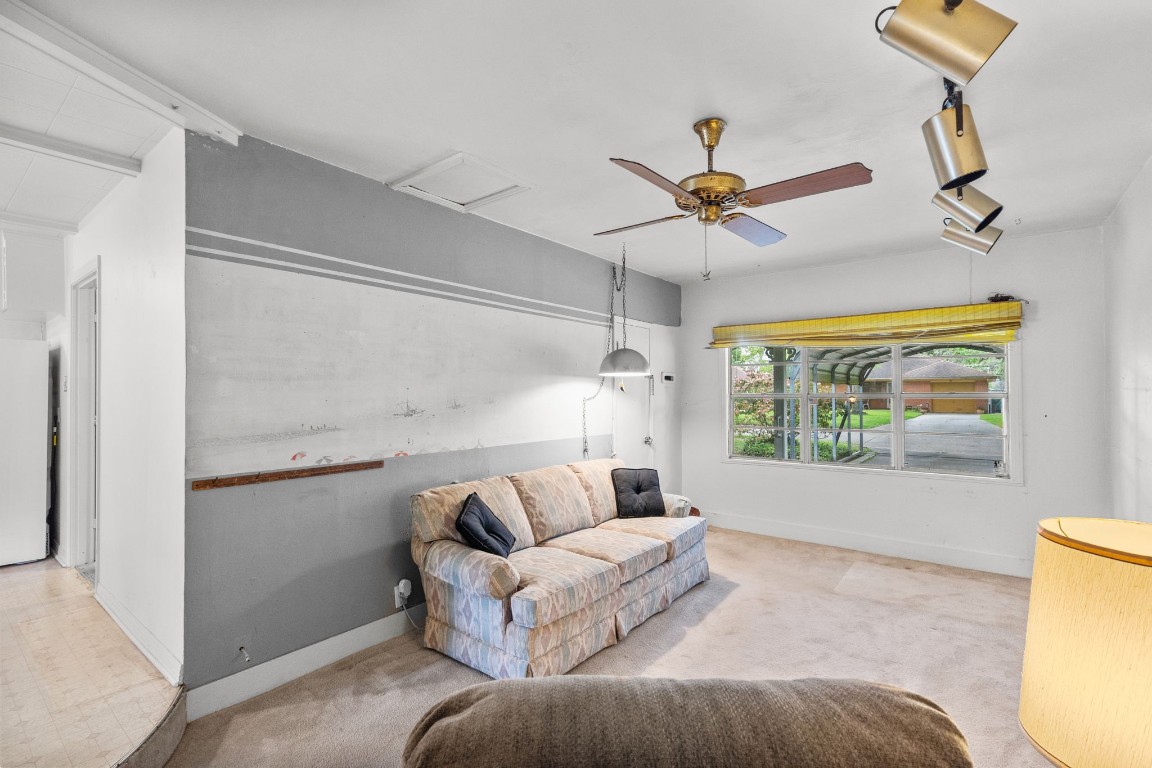 1126 Orange Street La Marque, TX 77568 - Photo 16 of 36 a living room with furniture and a window
