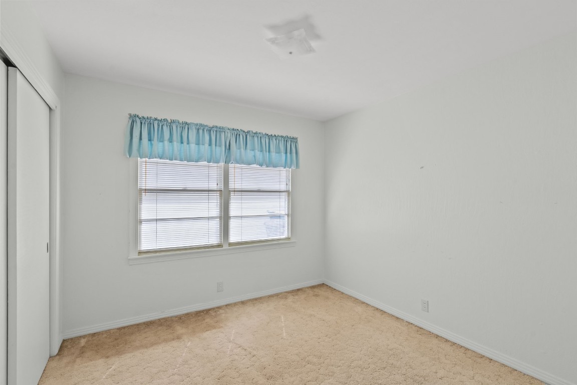 1126 Orange Street La Marque, TX 77568 - Photo 24 of 36 an empty room with a window