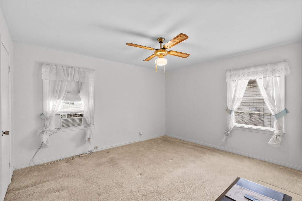 1126 Orange Street La Marque, TX 77568 - Photo 26 of 36 a view of an empty room with a window