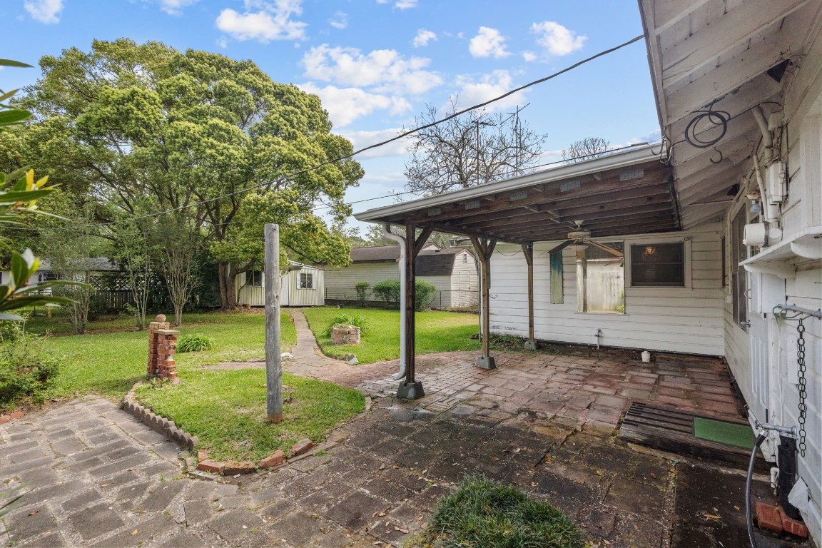 1126 Orange Street La Marque, TX 77568 - Photo 31 of 36 a view of a house with a backyard