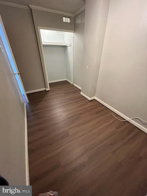 216 Boro Road, Unit A Secane, PA 19018 - Photo 5 of 26 an empty room with wooden floor closet and windows