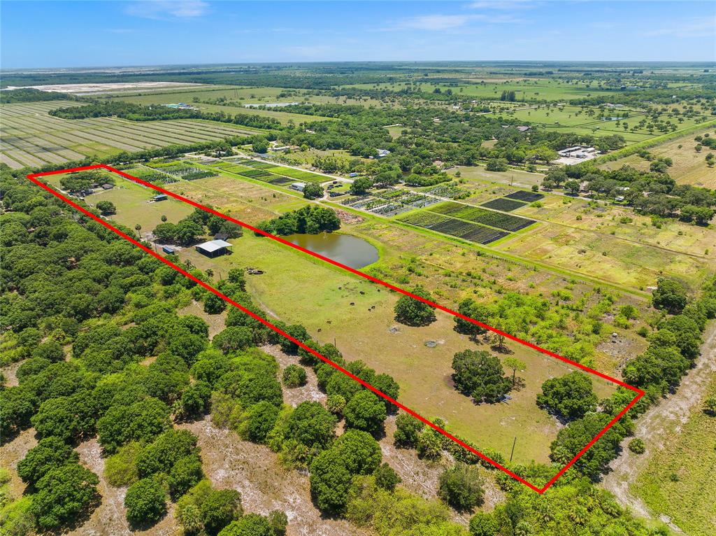 10100 West Midway Road Fort Pierce, FL 34945 - Photo 15 of 15 a view of an outdoor space and a lake view