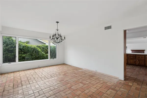 a view of a room with a large window