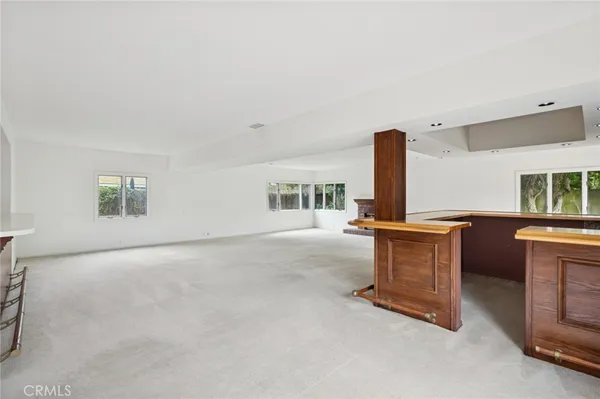 a view of workspace with furniture and window