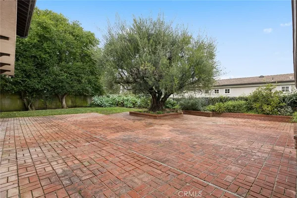 a view of a street with a yard