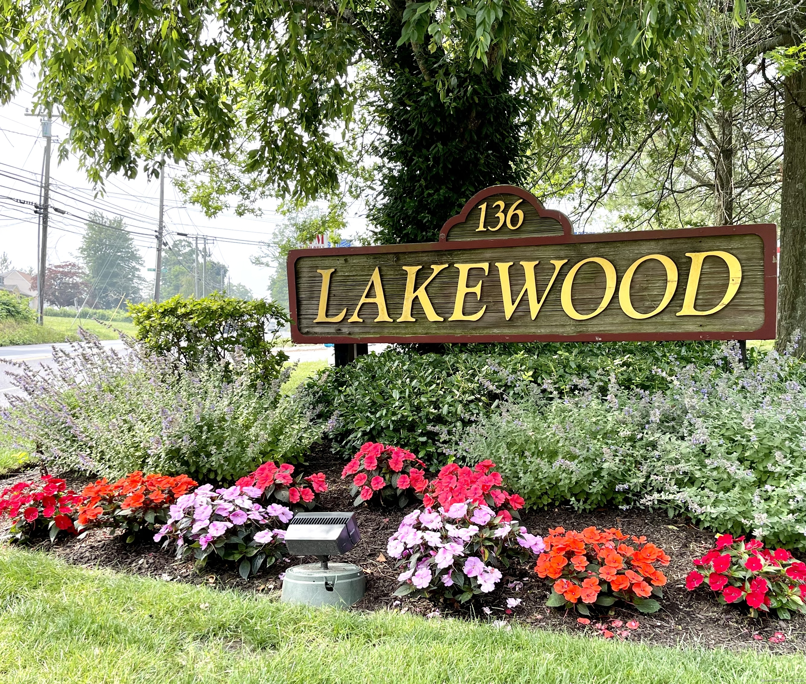 136 Pembroke Road, Unit 11101 Danbury, CT 06811 - Photo 17 of 17 a view of front of flowers and flowers