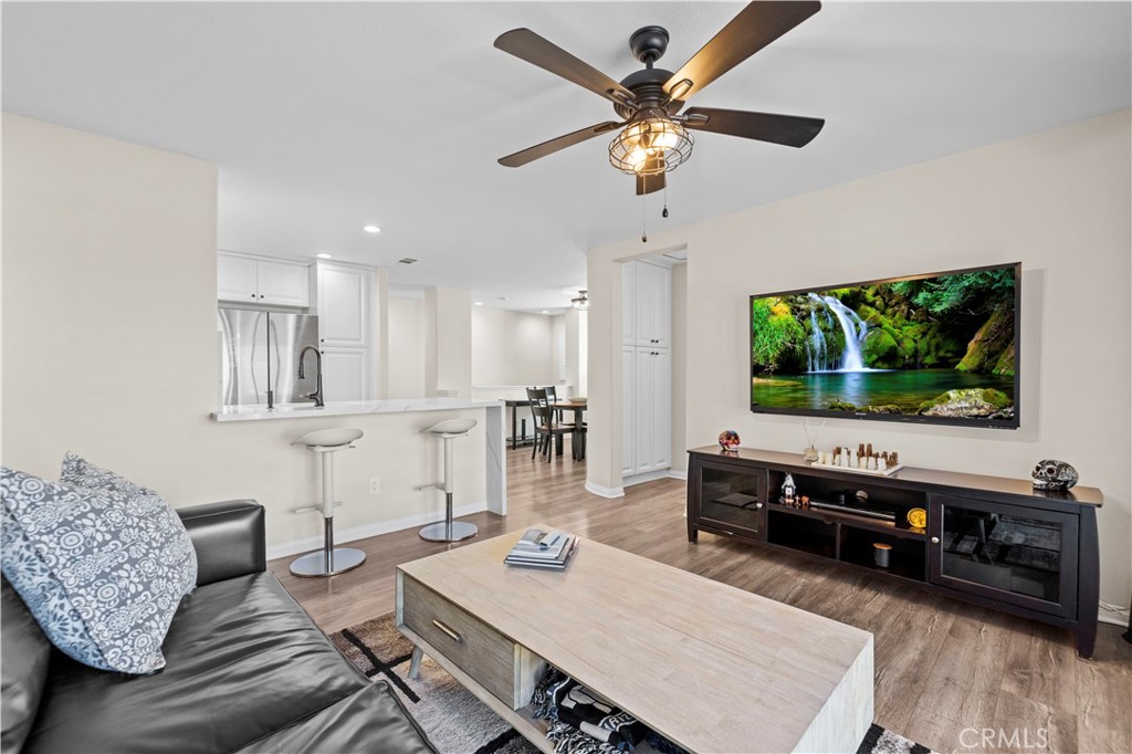 28454 Santa Rosa Lane Saugus, CA 91350 - Photo 11 of 36 a living room with furniture and a flat screen tv