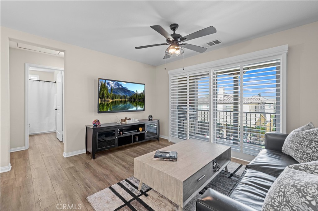 28454 Santa Rosa Lane Saugus, CA 91350 - Photo 13 of 36 a living room with furniture and a flat screen tv