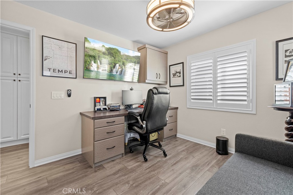 28454 Santa Rosa Lane Saugus, CA 91350 - Photo 17 of 36 a view of a livingroom with workspace and a window