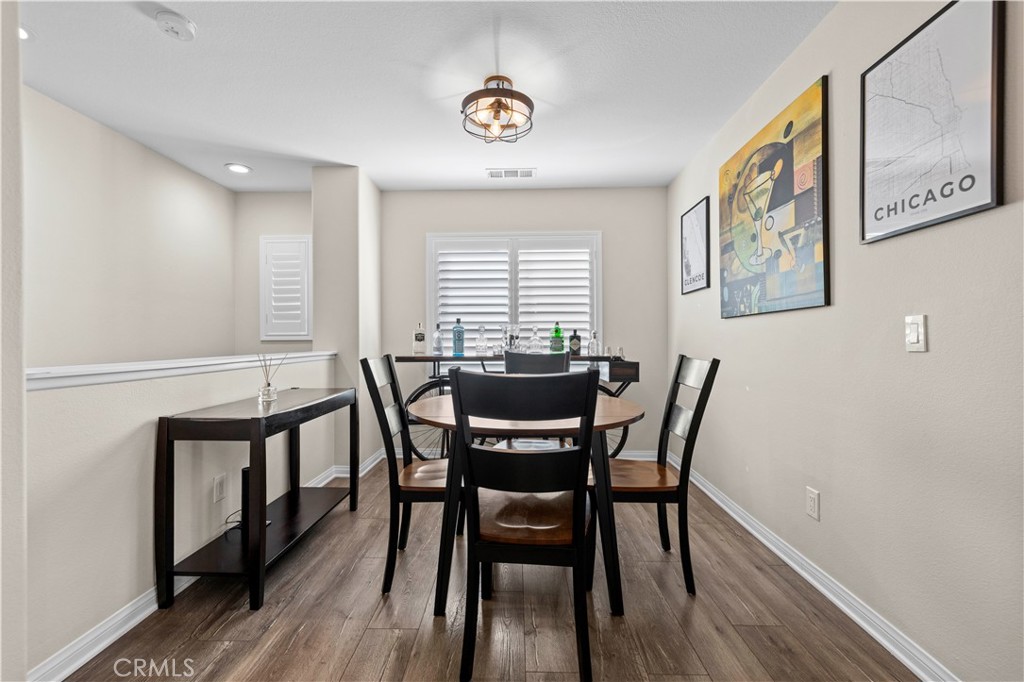 28454 Santa Rosa Lane Saugus, CA 91350 - Photo 5 of 36 a view of a dining room with furniture window and wooden floor