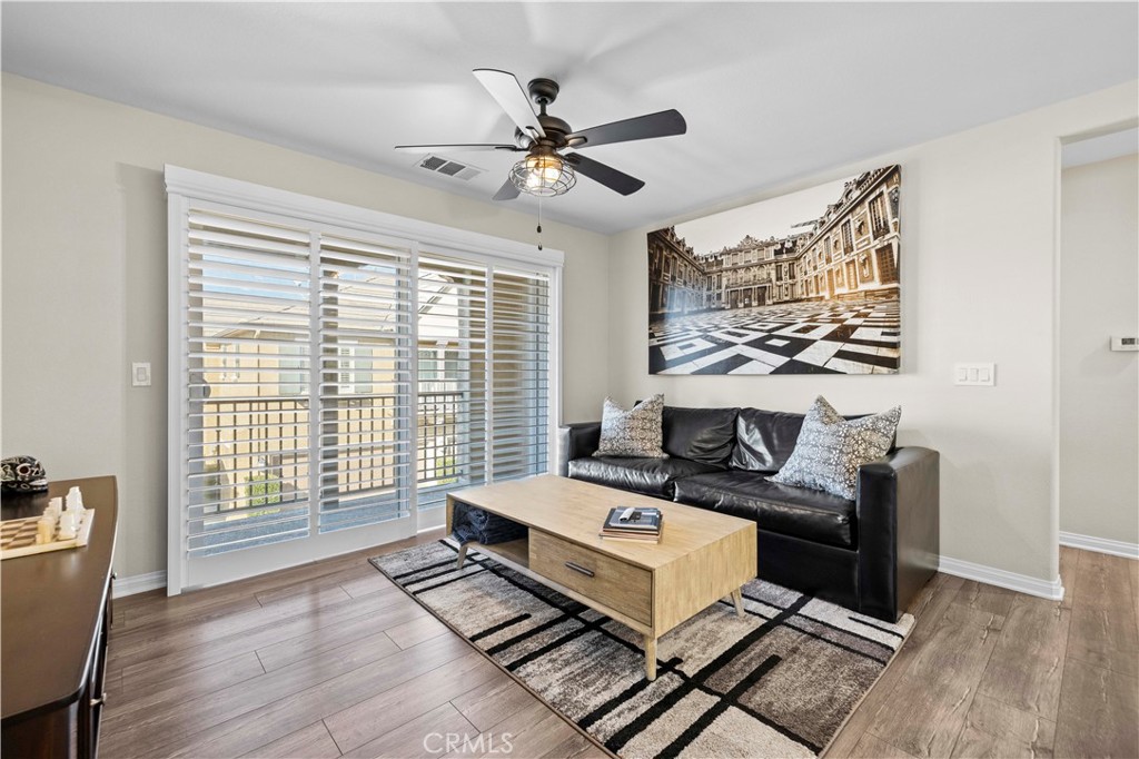 28454 Santa Rosa Lane Saugus, CA 91350 - Photo 10 of 36 a living room with furniture and a window
