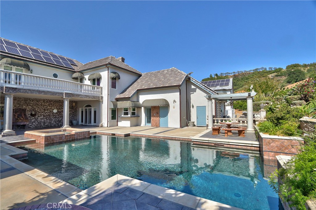 46856 El Prado Road Temecula, CA 92590 - Photo 10 of 75 a front view of a house with garden