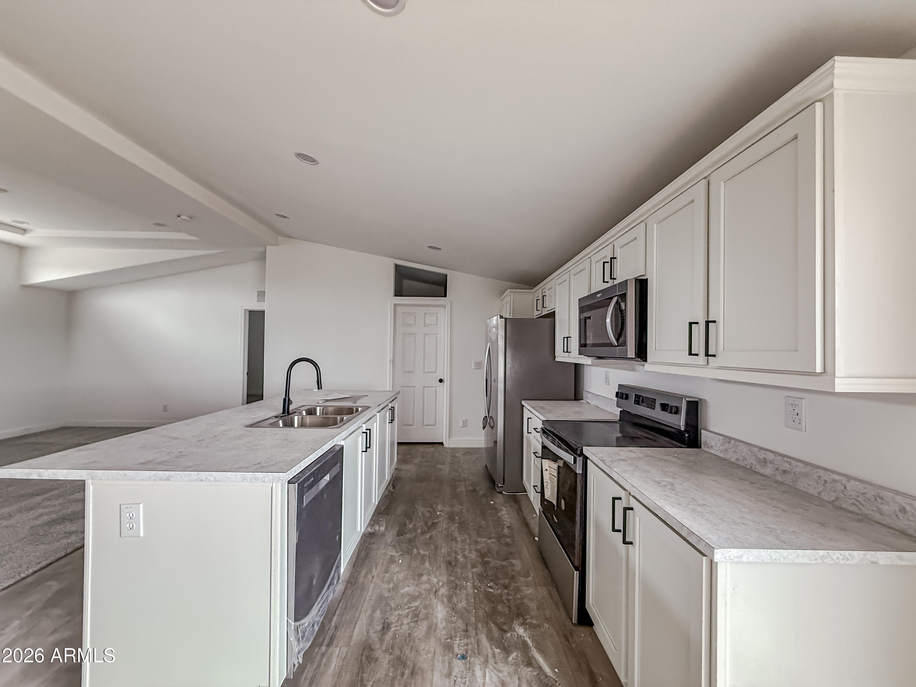 22775 East Day Spring Lane Florence, AZ 85132 - Photo 3 of 16 a kitchen with stainless steel appliances granite countertop a sink stove and cabinets
